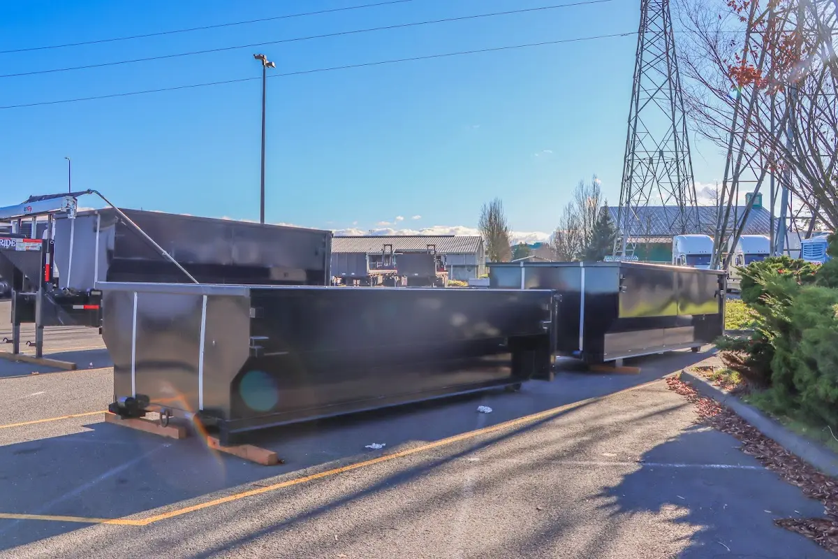 Roll-off dumpster ready for waste disposal at job site for 2 Yard Dumpster Rental in Batesville